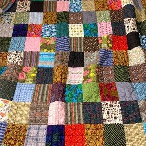 Vintage multicolored patchwork quilt.